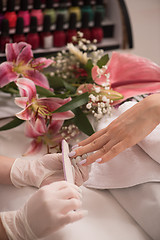 Image showing Woman hands receiving a manicure