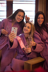 Image showing girls doing Selfy on  bachelorette party