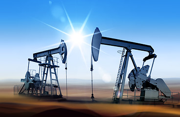 Image showing oil pumps at sunset