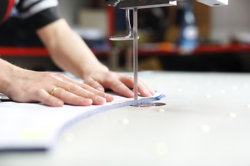 Image showing Knife, table punching fabric.