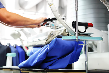 Image showing Steam iron. Ironing steam.