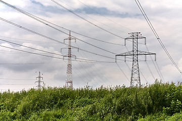 Image showing Electric lines on land