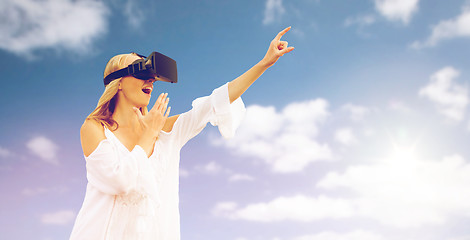 Image showing amazed woman in virtual reality headset 