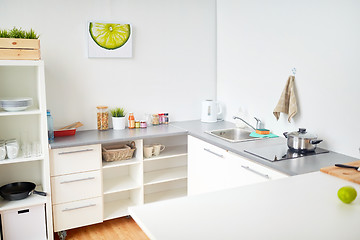 Image showing modern home kitchen interior with food on table