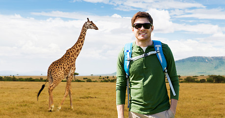 Image showing happy young man with backpack traveling in africa