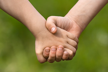 Image showing hands of two children, friendship concept