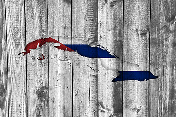 Image showing Map and flag of Cuba on weathered wood