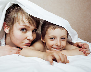 Image showing young blond woman with little boy in bed, mother and son, happy familyyoung blond woman with little boy in bed, mother and son, happy family