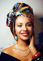 Image showing beauty bright african woman with creative make up, shawl on head