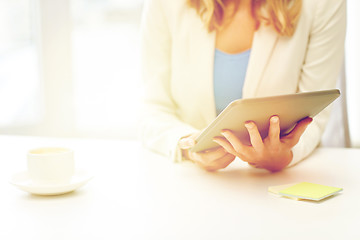 Image showing close up of businesswoman with tablet pc 