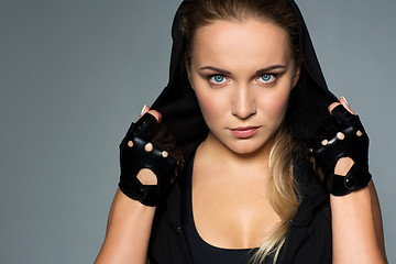 Image showing close up of woman in black sportswear