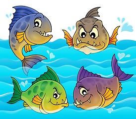 Image showing Water and four piranhas