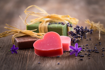 Image showing Handmade soap on wooden table