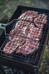 Image showing Grilling fresh entrecote pork