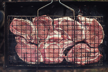 Image showing Grilling fresh entrecote pork