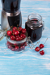 Image showing Cherry juice with glass of berries