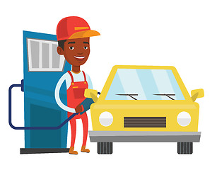 Image showing Worker filling up fuel into car.