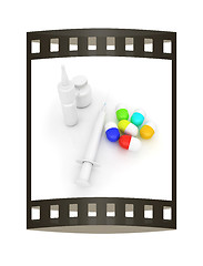Image showing Syringe, tablet, pill jar. 3D illustration. The film strip