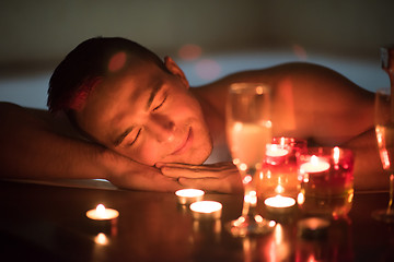 Image showing man relaxing in the jacuzzi