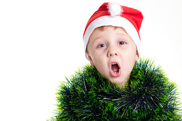 Image showing Happy little smiling boy with christmas hat.