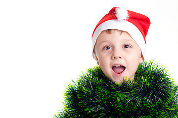 Image showing Happy little smiling boy with christmas hat.