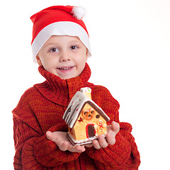 Image showing Happy little smiling boy with christmas hat.