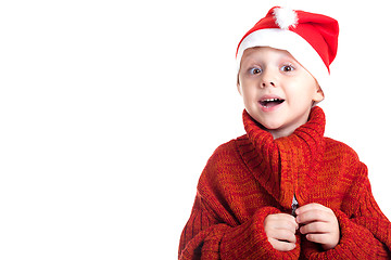 Image showing Happy little smiling boy with christmas hat.