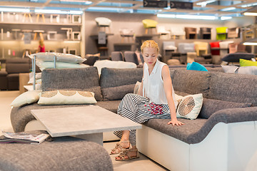 Image showing Woman shopping for furniture, sofa and home decor in store