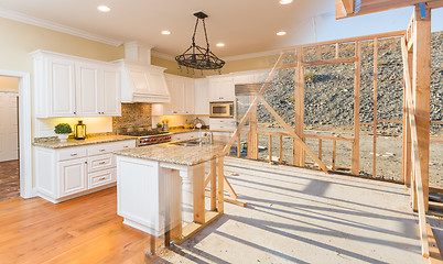 Image showing Transition of Beautiful New Home Kitchen From Framing To Complet