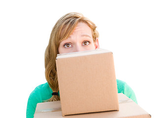 Image showing Happy Young Adult Woman Holding Moving Boxes Isolated On A White