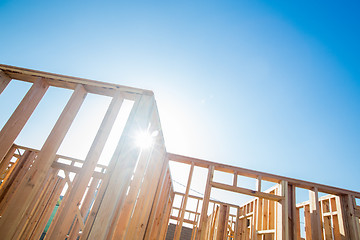 Image showing Wood Home Framing Abstract At Construction Site.