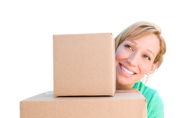 Image showing Happy Young Adult Woman Holding Moving Boxes Isolated On A White