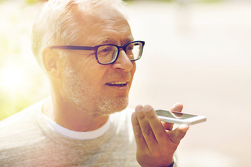 Image showing old man using voice command recorder on smartphone