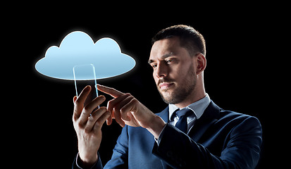 Image showing businessman with transparent smartphone