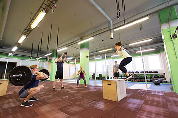 Image showing group of people exercising in gym