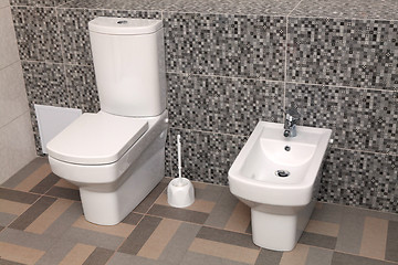 Image showing white toilet bowl and bidet in wc