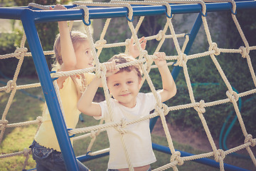 Image showing happy children playing on the playground