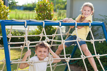 Image showing happy children playing on the playground