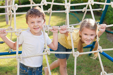 Image showing happy children playing on the playground