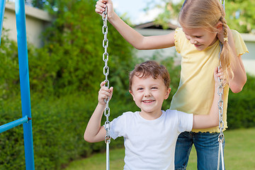 Image showing happy children playing on the playground