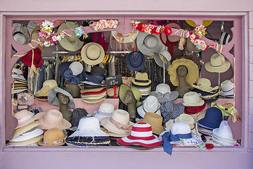 Image showing Open market stall with summer straw hats