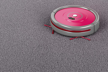 Image showing Robot vacuum cleaner on the carpet