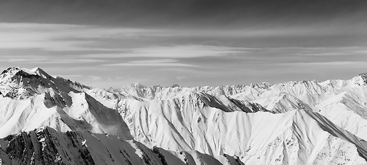 Image showing Black and white panorama of snowy mountains in nice winter day