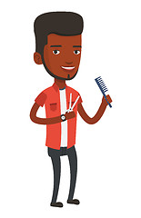 Image showing Barber holding comb and scissors in hands.