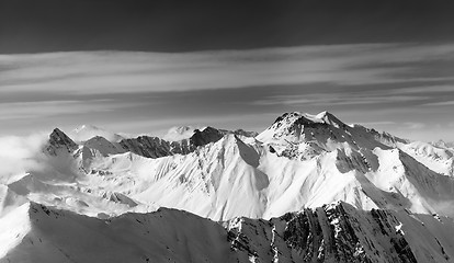 Image showing Black and white panorama of snowy mountains in winter