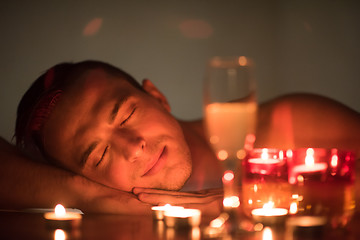 Image showing man relaxing in the jacuzzi