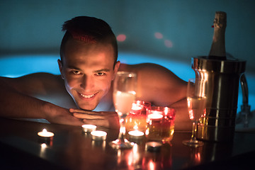 Image showing man relaxing in the jacuzzi