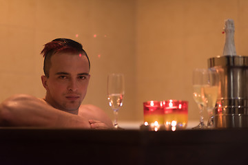 Image showing man relaxing in the jacuzzi