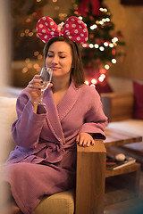 Image showing woman drinking champagne at spa