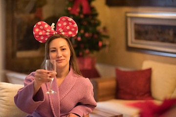 Image showing woman drinking champagne at spa